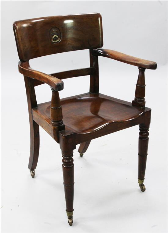 A Victorian mahogany elbow chair